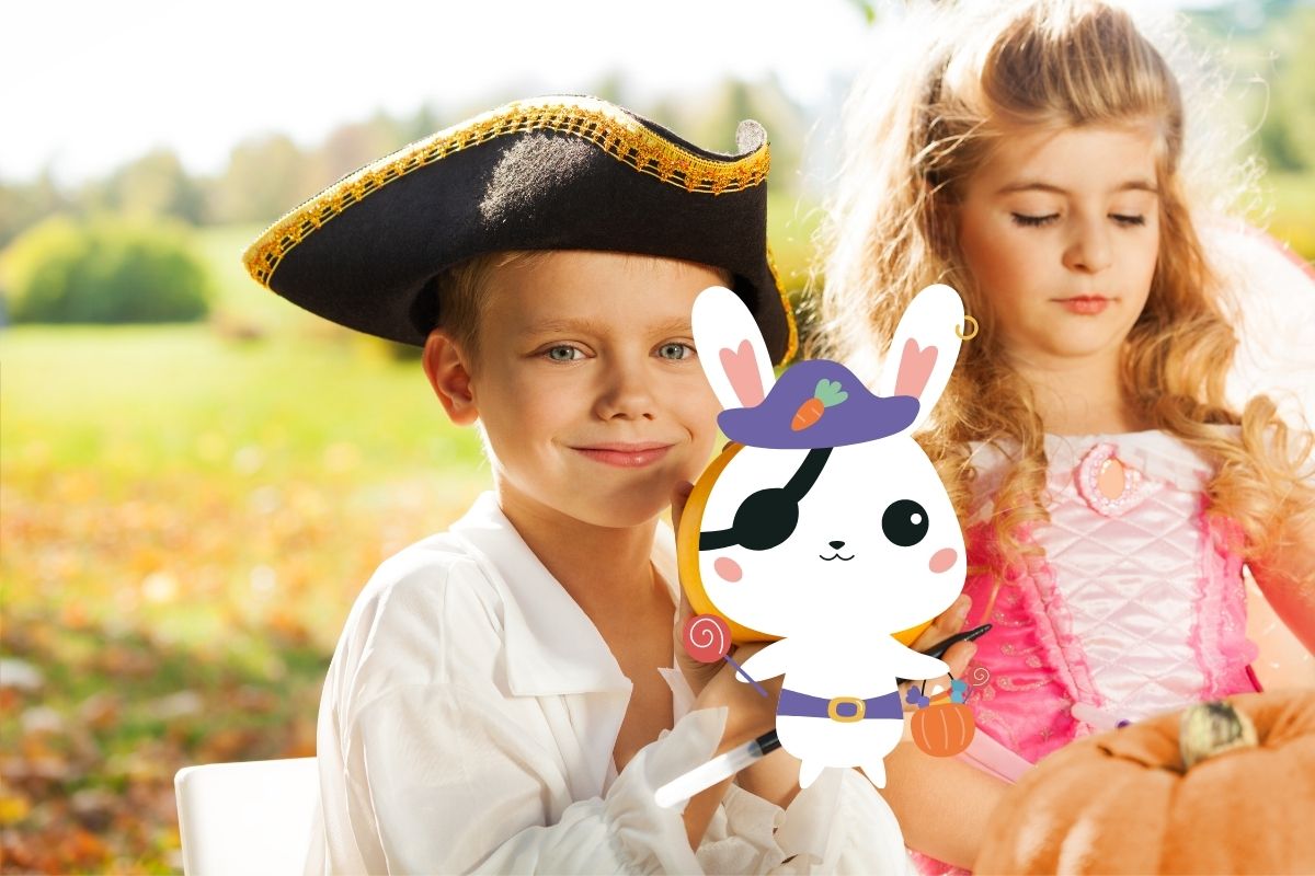 Boy in pirate hat and girl in princess dress