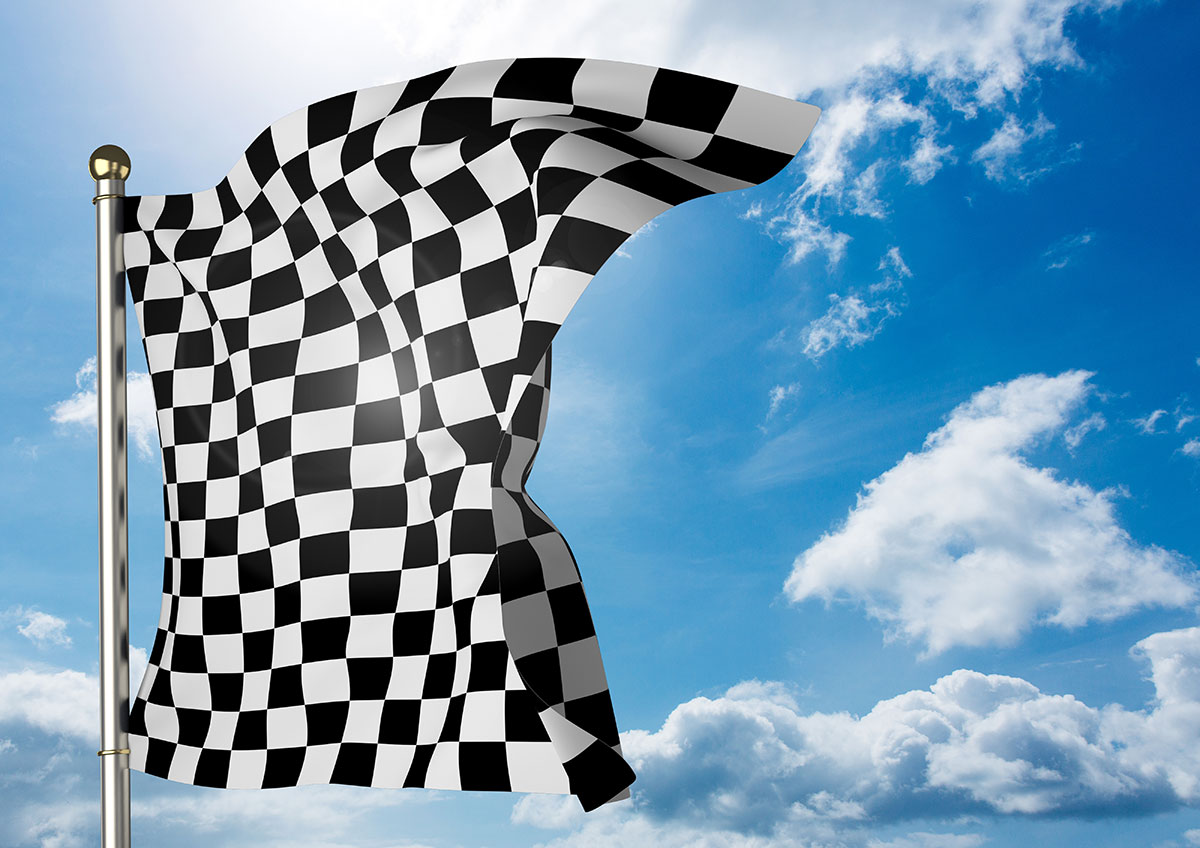 Checkered flag waving on a sunny day